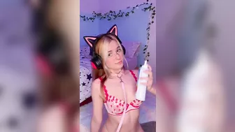 Egirl in lingerie puts cream in her mouth