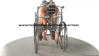 Slave Hardcore Cuffed and Chained in a Wheelchair Metal Bondage BDSM